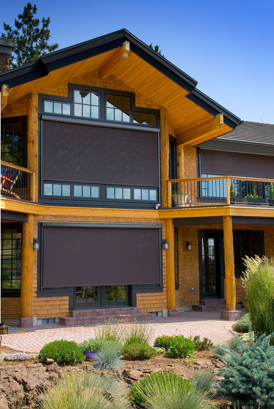 Exterior of home with sunshades